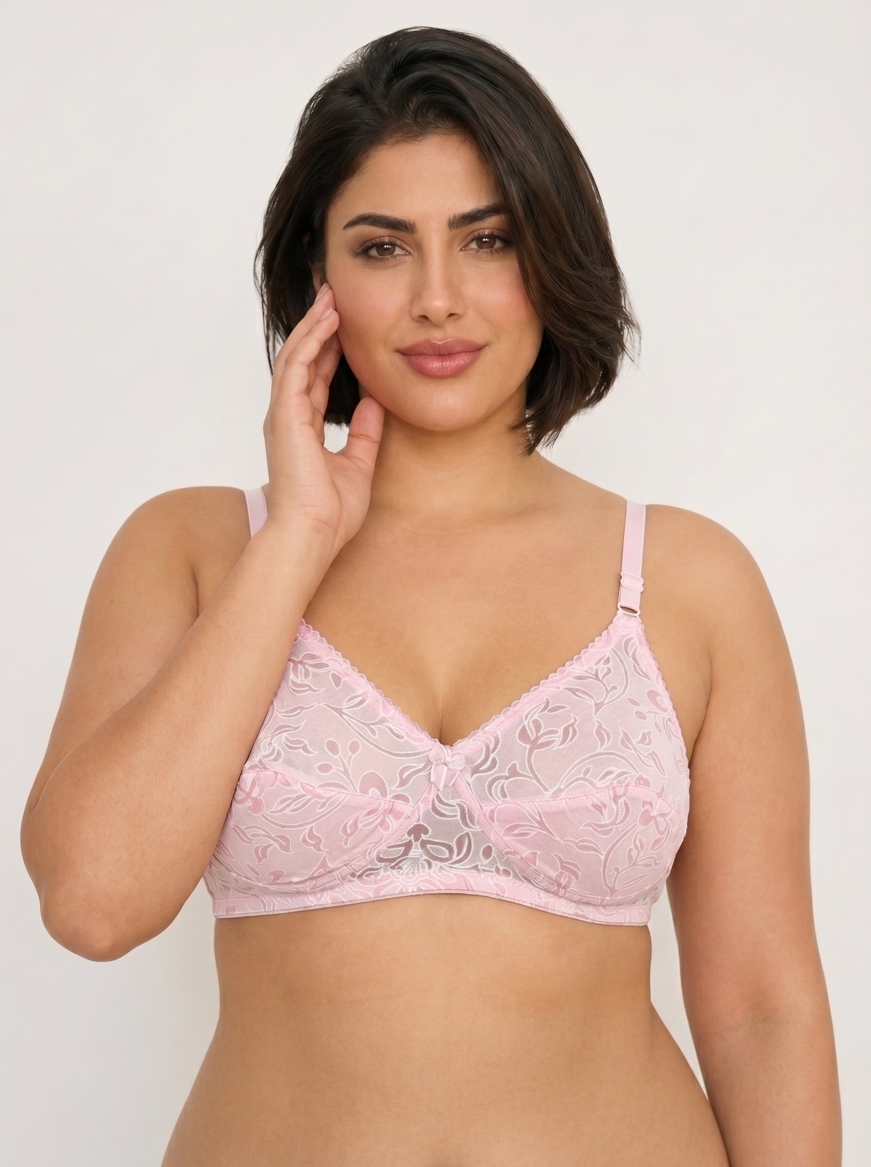 Pink floral lace women’s bra with adjustable straps, front view on model. #color_pink