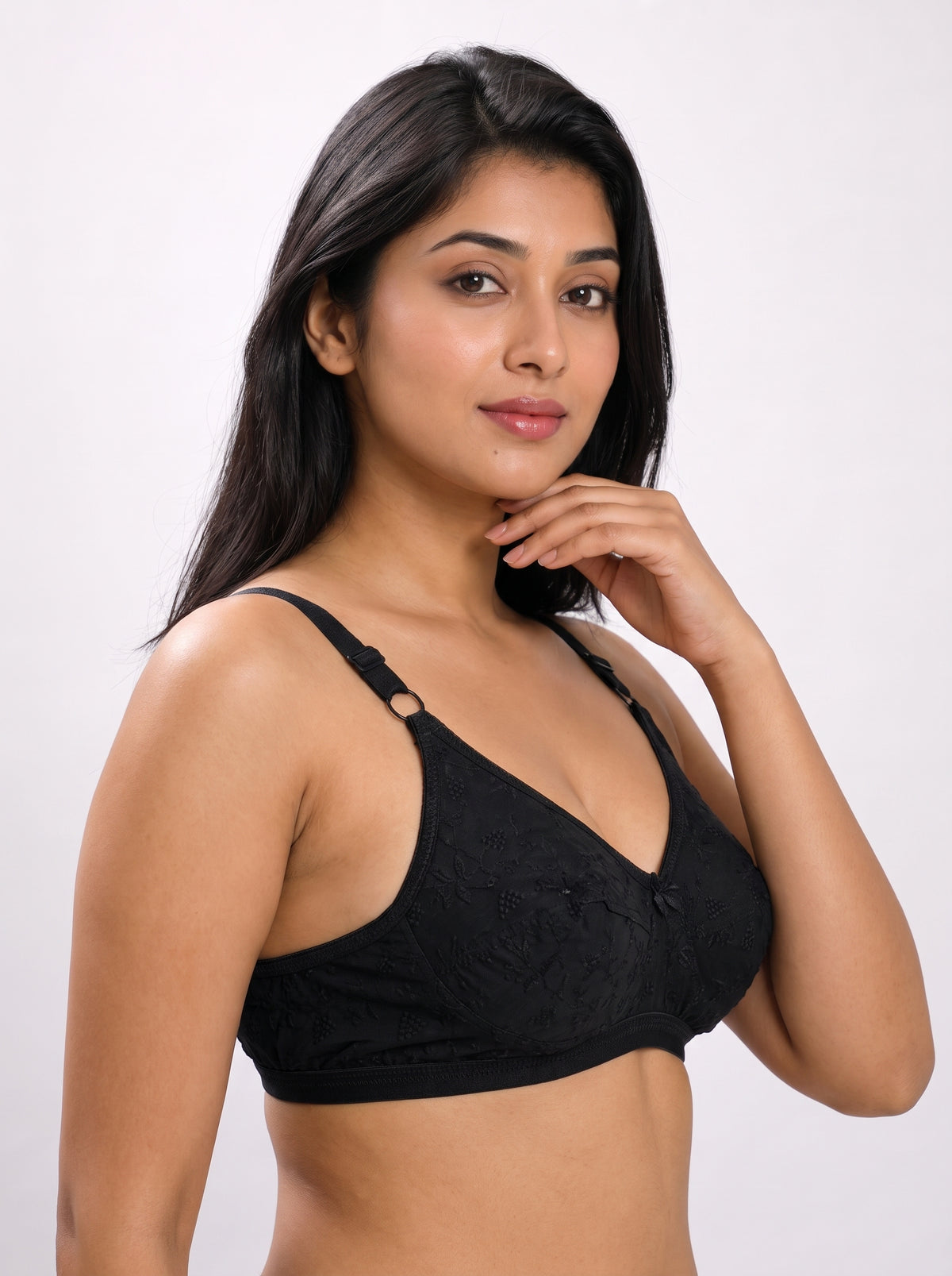 Like-Me Sonu Bra in black with floral lace cups and adjustable straps, side view on model. #color_black