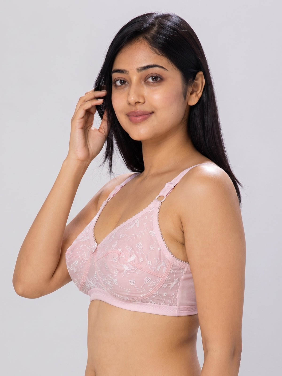 Like-Me Sonu Bra in pink with floral lace cups and adjustable straps, side view on model. #color_pink
