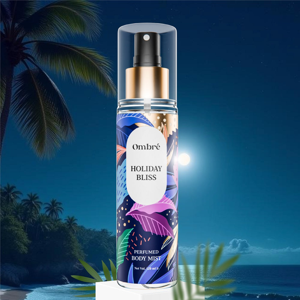 Ombré Holiday Bliss Perfumed Body Mist displayed over a tropical beach night moon light background with palm trees