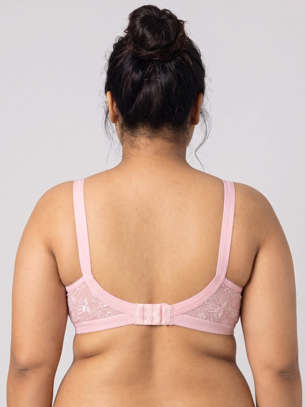 Like-Me Sonu Bra in pink with wide straps and hook-and-eye back closure, back view on plus-size model. #color_pink