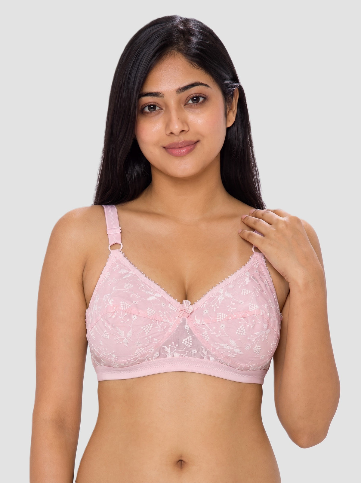 Like-Me Sonu Bra in pink with floral lace cups, center bow and adjustable straps, front view on model. #color_pink