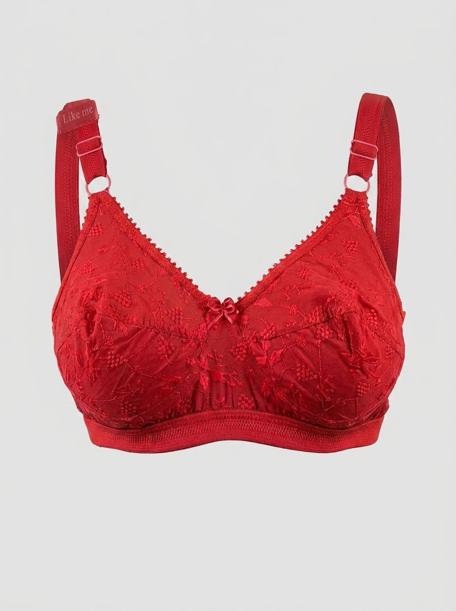 Like-Me Sonu Bra in red with floral lace cups, center bow and adjustable straps, ghost mannequin front view. #color_red
